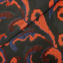 Ткань жаккард черного цвета с оранжевыми и синими узорами