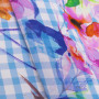 Ткань плательная в бело-голубую клетку с цветочным принтом