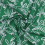 Ткань лен вискоза зеленого цвета с белыми цветами 