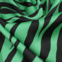 Ткань искусственный шелк с анималистичным зелено-черным принтом