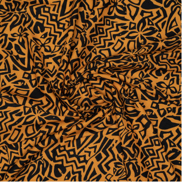 Ткань плательная оранжевого цвета с черным принтом