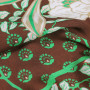 Плательная ткань с зелено-коричневым цветочным принтом