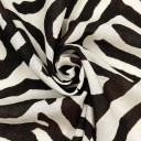 Ткань плательная лен бело-коричневого цвета с анималистичным принтом