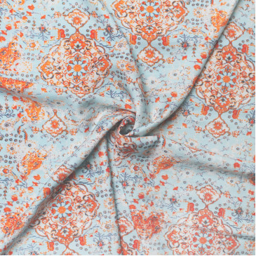 Ткань плательная голубая с оранжевым принтом 