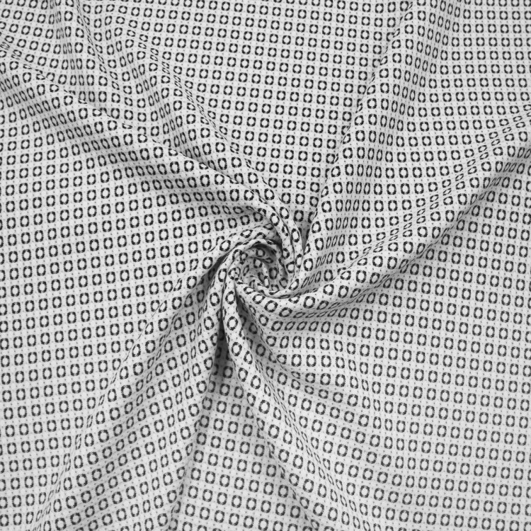 Костюмная ткань с геометрическим черно-белым узором