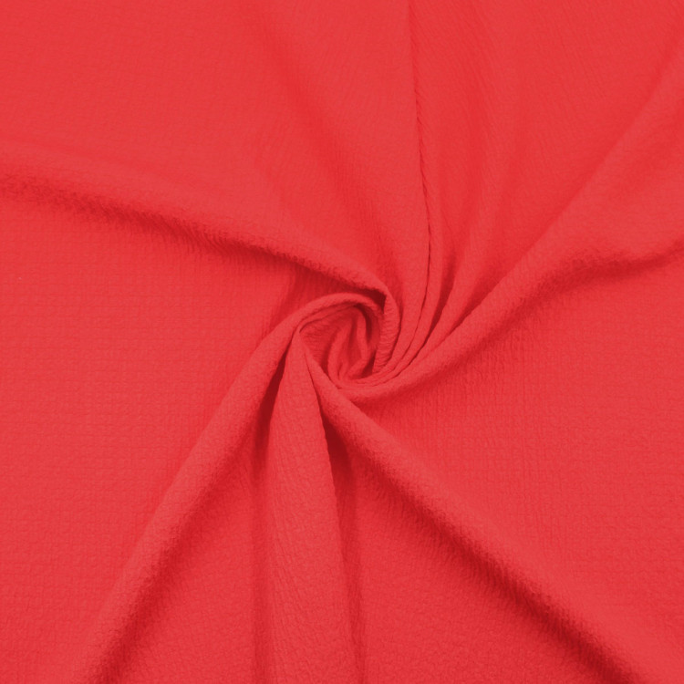 Плательная ткань красного цвета