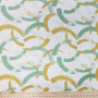 Плательная ткань с молочно-желтым принтом 