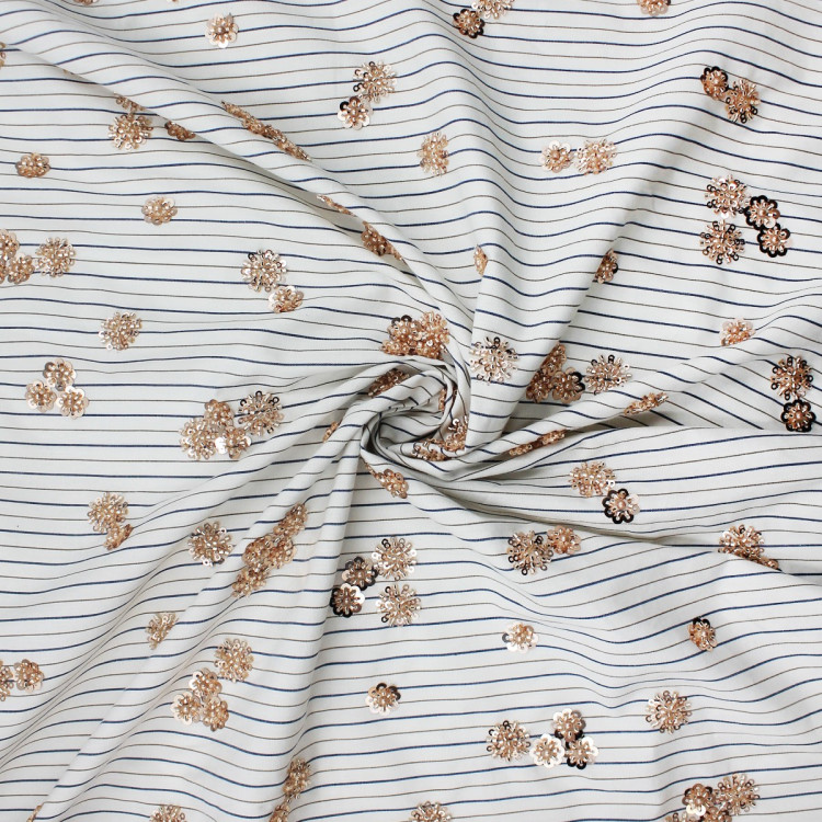 Ткань в полоску с бежевой вышивкой