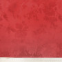 Атласная ткань с фактурным узором карминового цвета