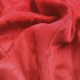 Атласная ткань с фактурным узором карминового цвета